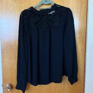 Black blouse with lace neck detail